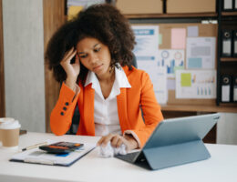 young business woman overwhelmed, imposter syndrome